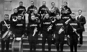The 15 members of the UA band pose with director Dr. Gustav Wittig in 1915.