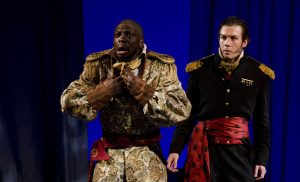 Iago watches as Othello reacts to news of his wife's (fictitious) infidelity