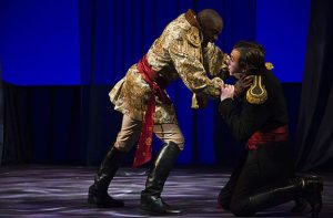 Othello grabbing Iago by the throat