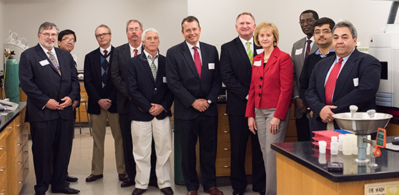 University of Alabama faculty and Waste Management officials