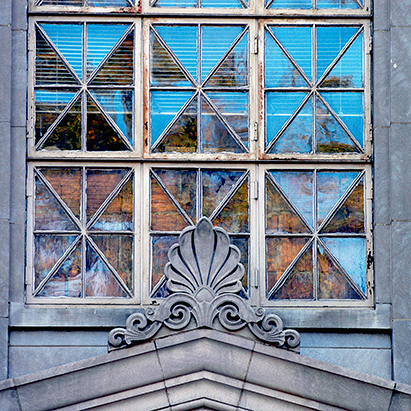 architectural detail of windows above front door to Farrah Hall
