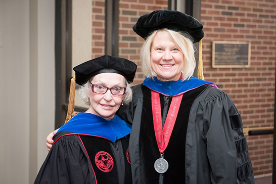 Ph.D. recipient Dorothy Franklin (left). Natalie Adams, New College Director (right).