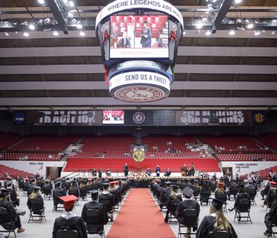 socially distanced commencement ceremony in Coleman Coliseum