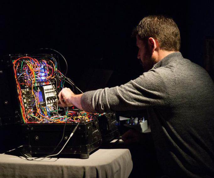 Andrew Raffo Dewar performing with synthesizer