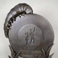 steel sculpture by Jonathan Lanier featuring a caterpillar and Children's of Alabama logo