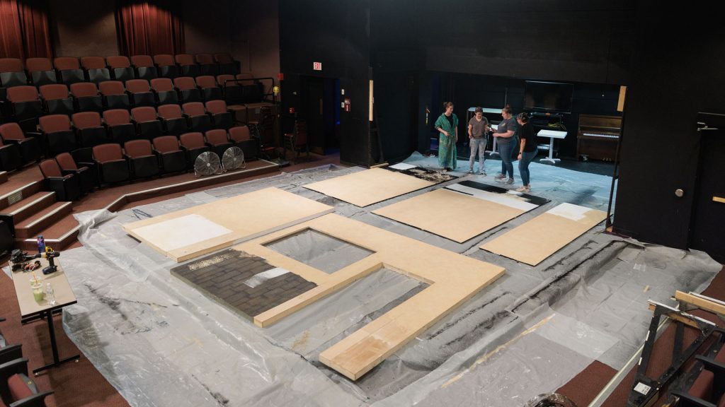 students building a set in the Allen Bales Theatre