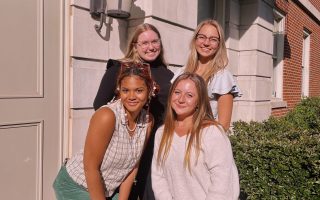 Women in Physics and Astronomy (WiPA) Group Officers in front of Gallalee Hall